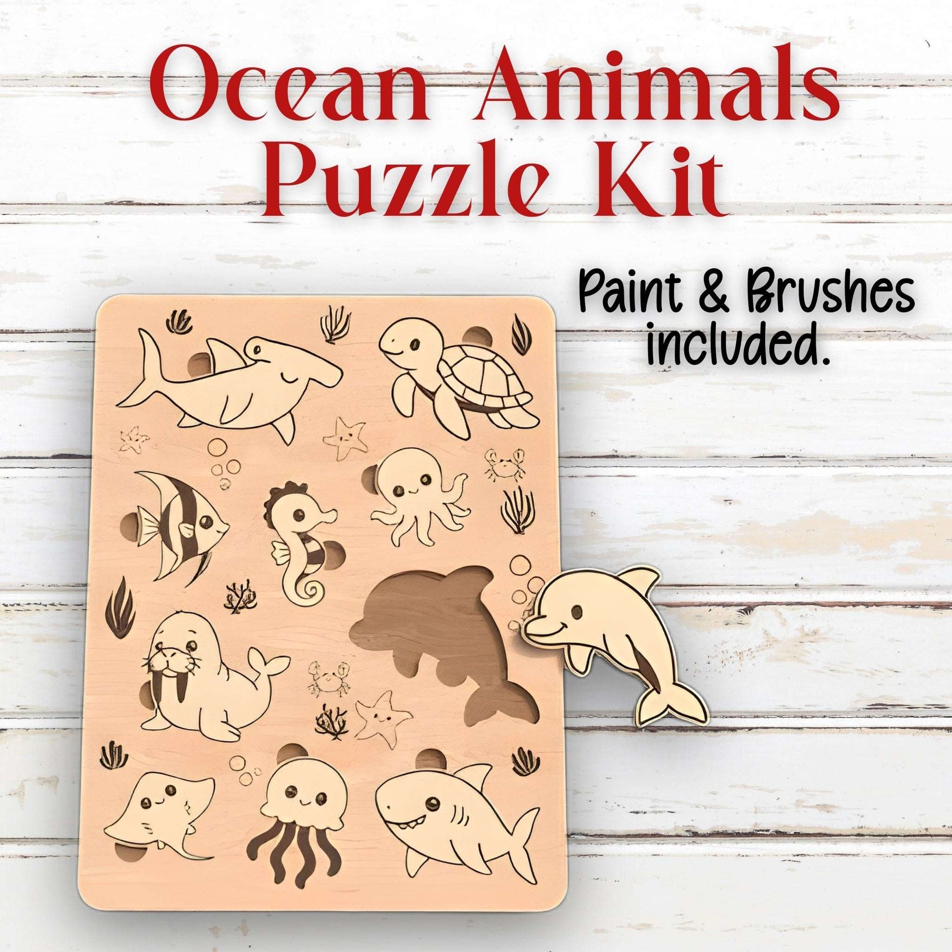 Ocean Animals Puzzle Kit with wooden puzzle and paint & brushes on a wooden background