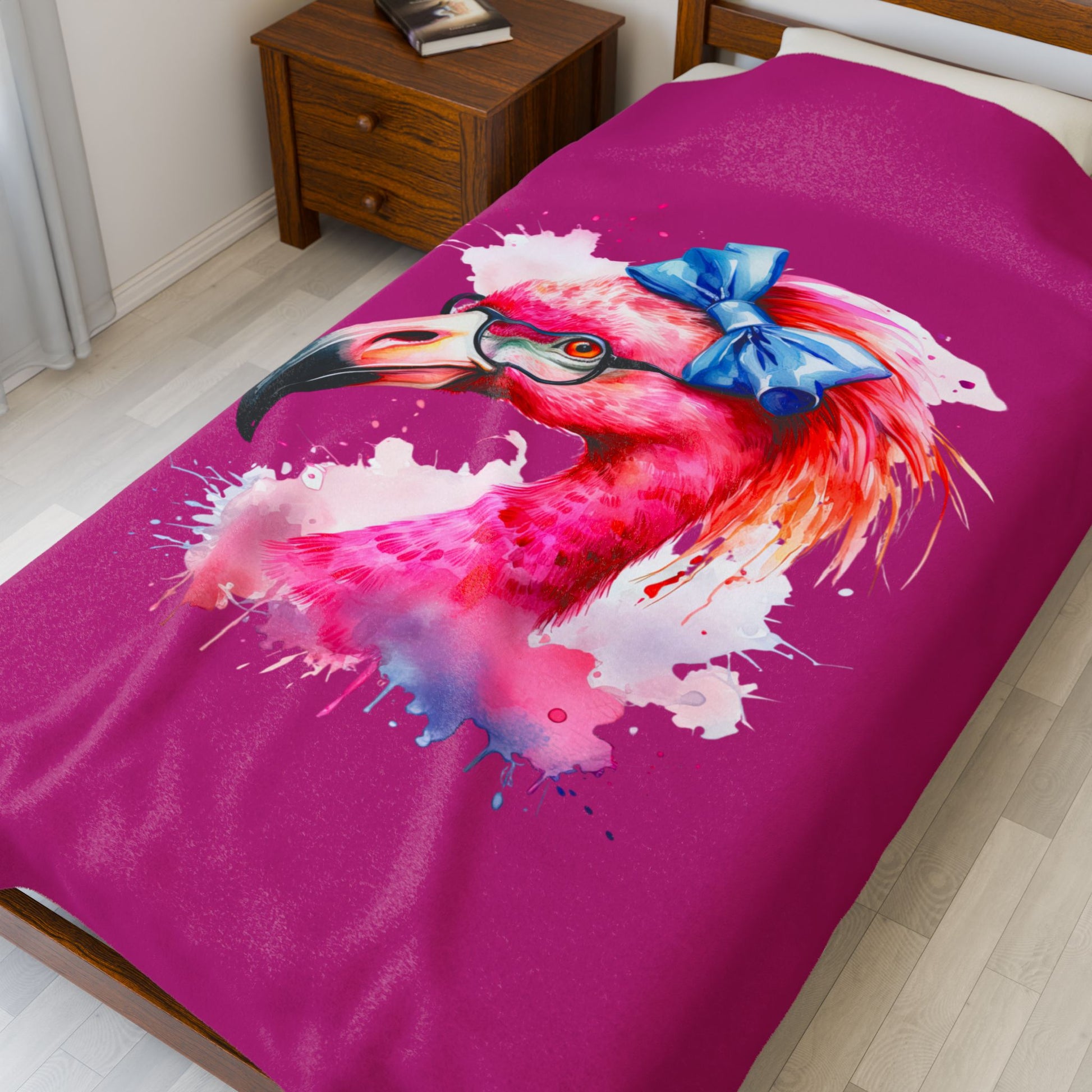 Glam Flamingo Plush Pink 60 x 80 Blanket with watercolor flamingo head, glasses, and blue bow.