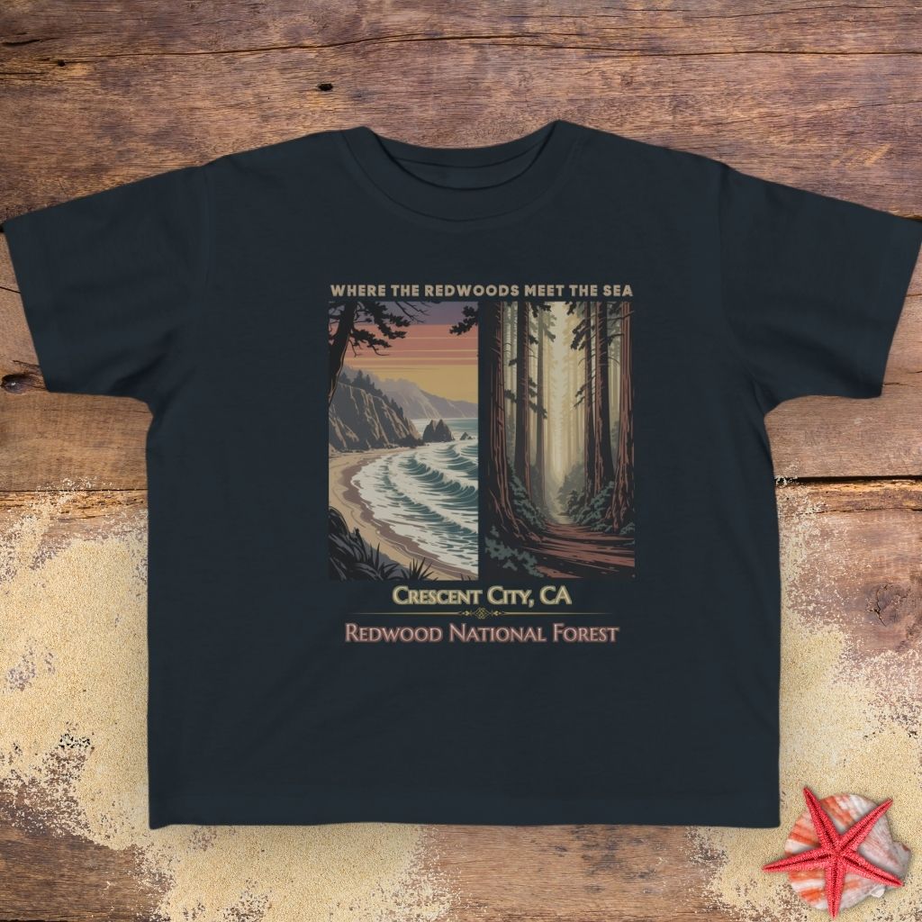A black Crescent City toddler T-shirt featuring vintage redwood forest and Pacific coast Where the Redwoods Meet the Sea design.