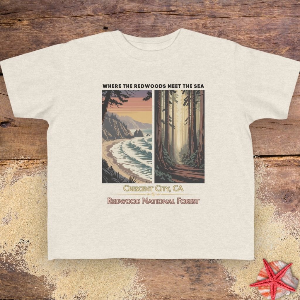 A beige Crescent City toddler T-shirt featuring vintage redwood forest and Pacific coast Where the Redwoods Meet the Sea design.