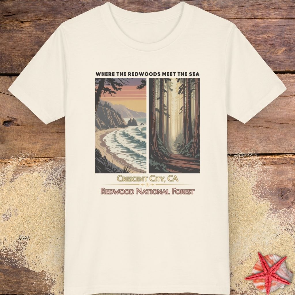 An beige short-sleeve child t-shirt with a vintage-style graphic print of a coastal scene and a redwood forest, labeled 'Oceans City, CA' and 'Redwood National Forest'. 