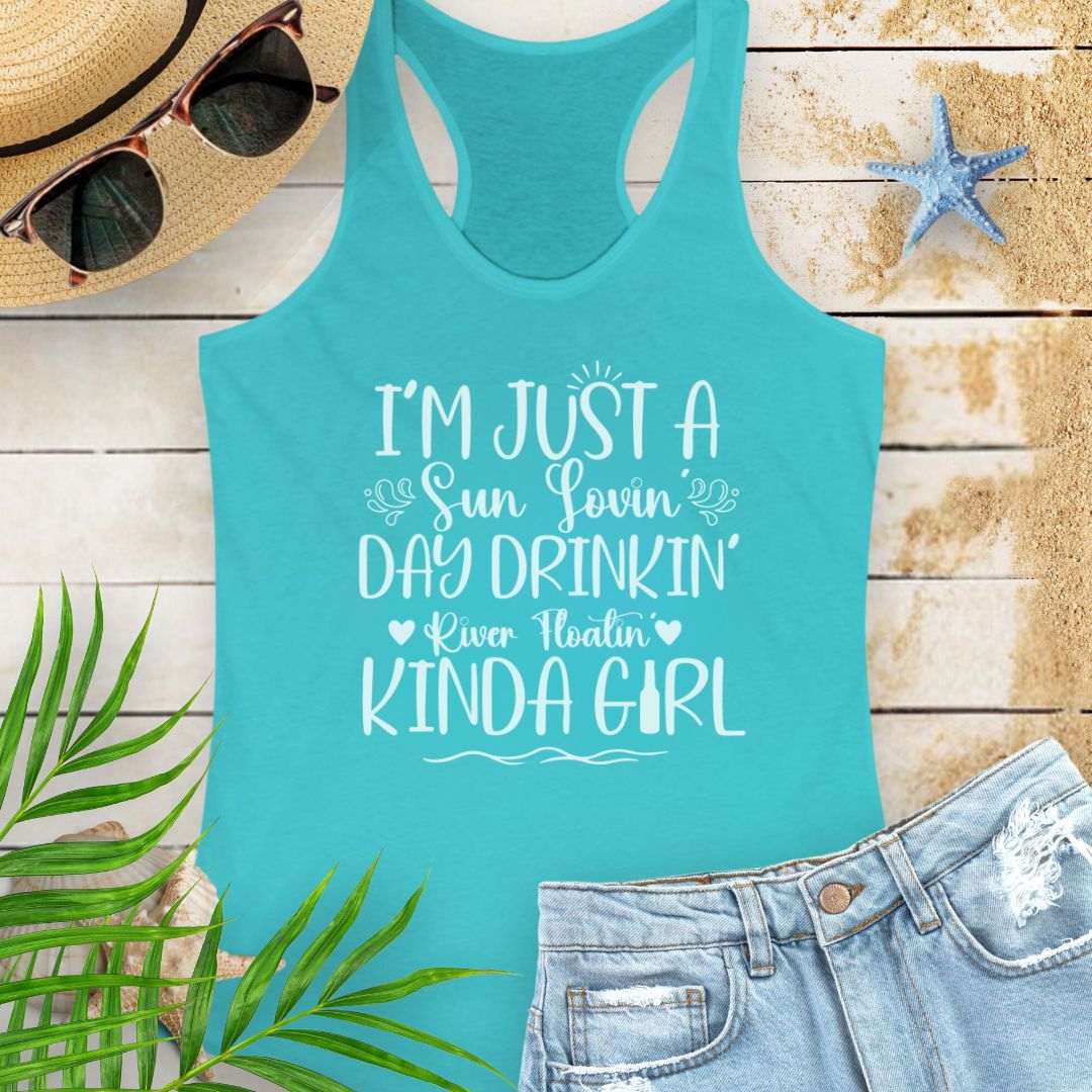 Tahiti Blue women’s racerback tank top with the phrase "Sun-loving, Day-drinking, River-floating Kind of Girl" printed on the front in a relaxed, summer-ready fit.