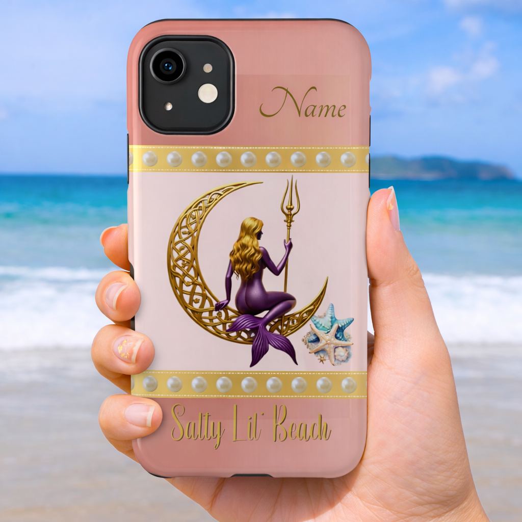 Phone case with mermaid sitting on a gold Celtic crescent moon and holding a trident with the text 'Salty Lil' Beach' on a pink and white background held by a hand on a beach