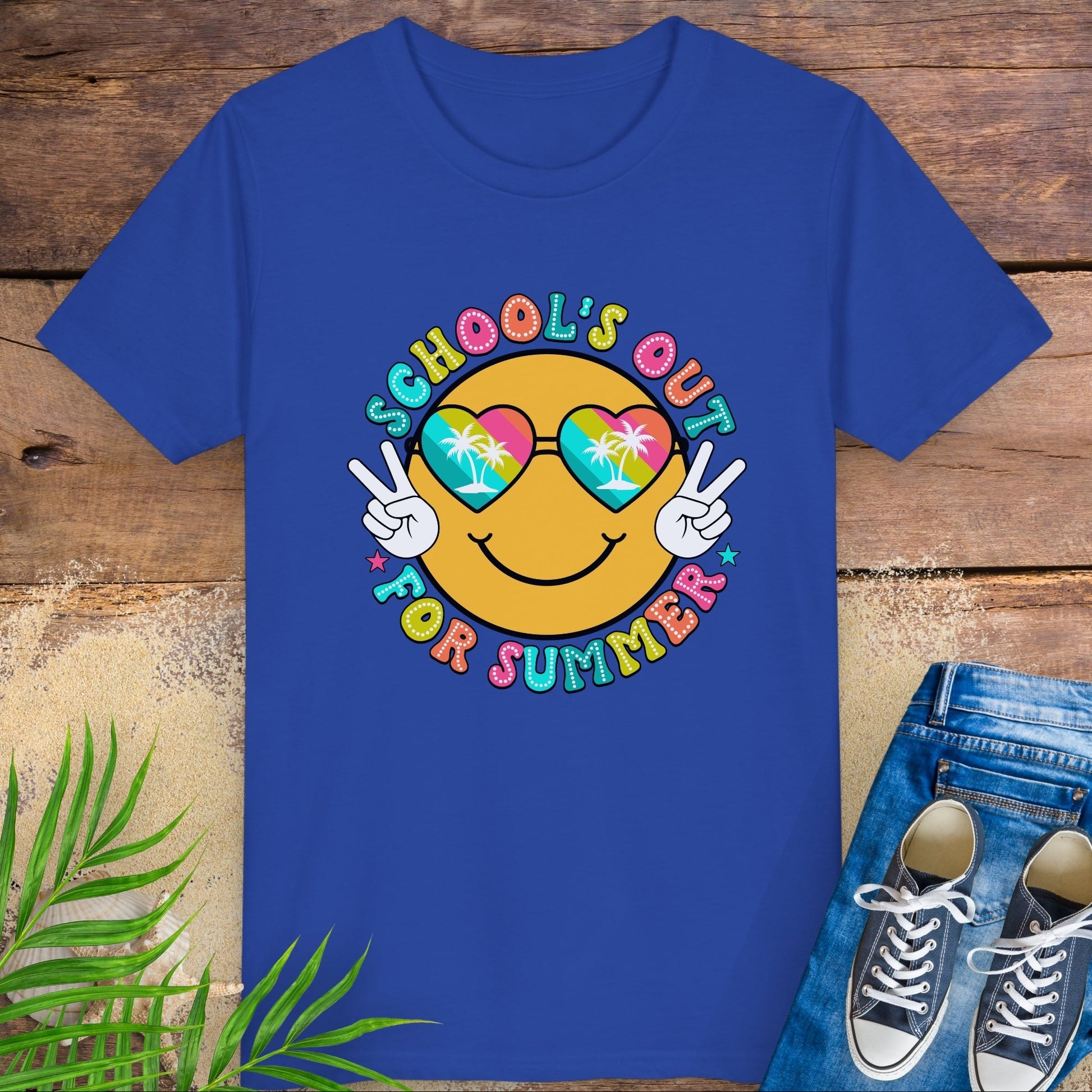 Royal Blue kids t-shirt with “School’s Out for Summer” text and smiley face wearing heart sunglasses with palm trees, making peace signs.