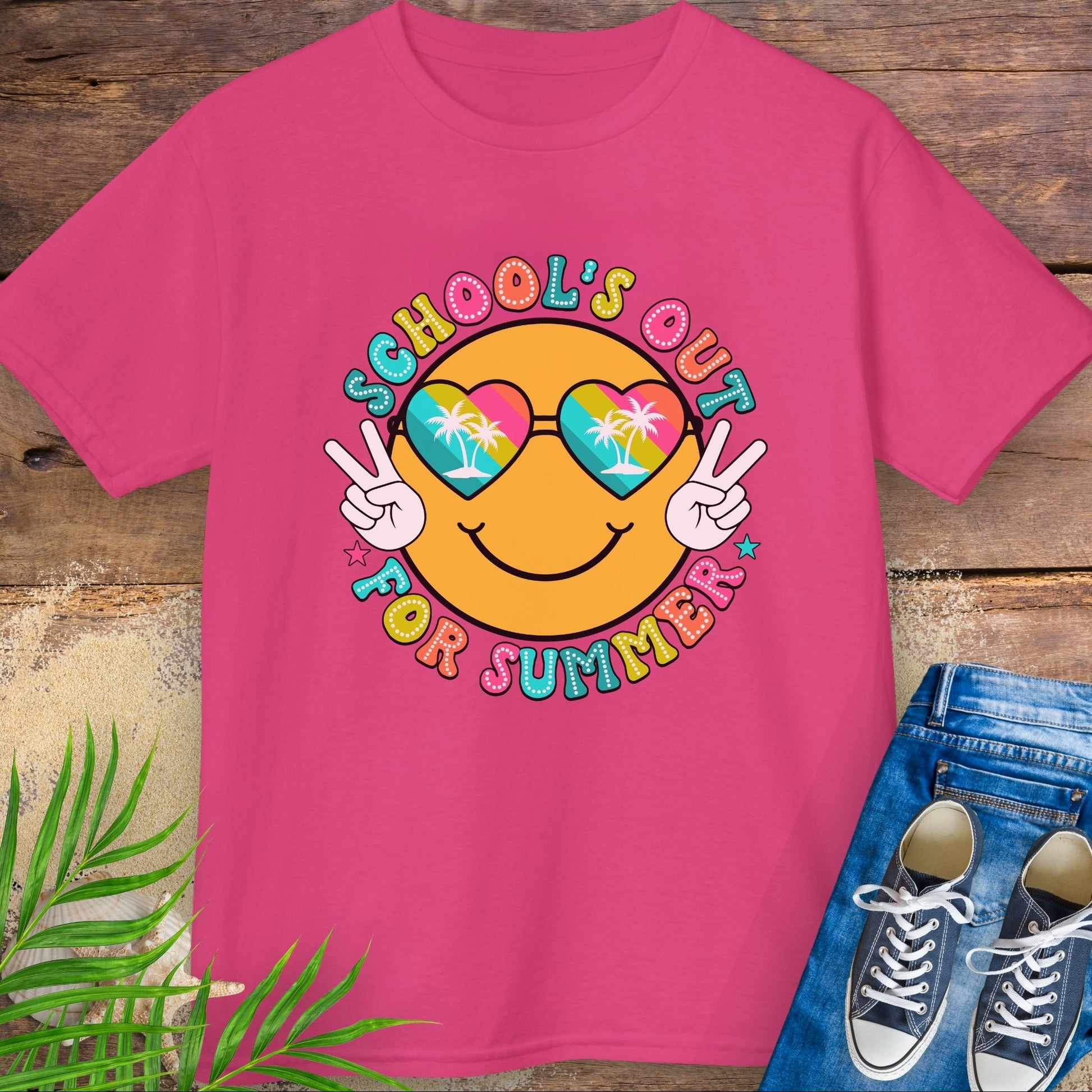 Hot Pink kids t-shirt with “School’s Out for Summer” text and smiley face wearing heart sunglasses with palm trees, making peace signs.                          