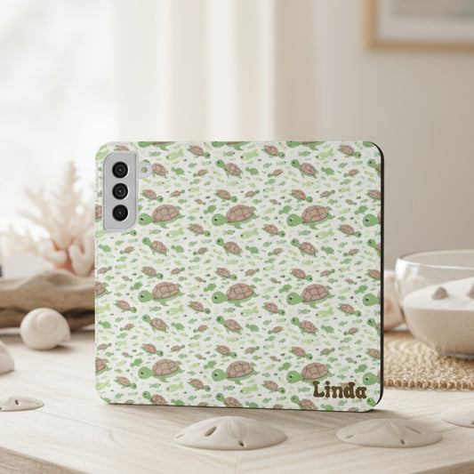 Phone case with turtle pattern and personalized name.