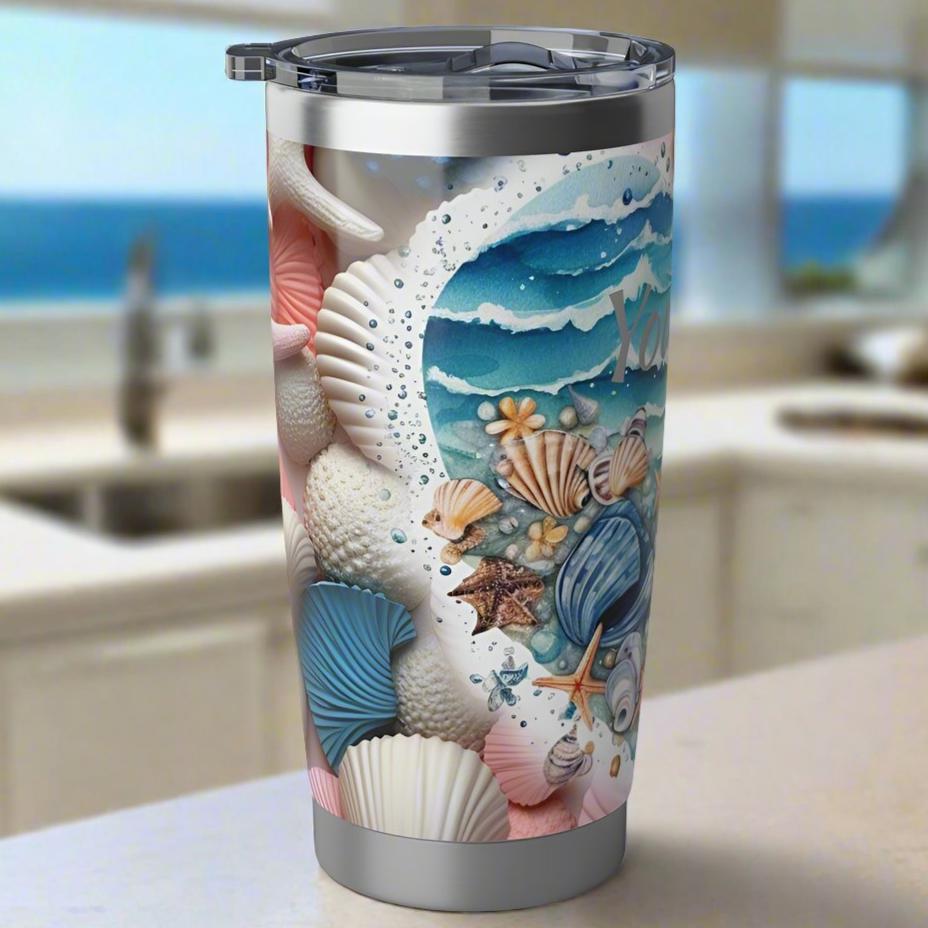 side view of 20 oz stainless steel tumbler with ocean wave heart on seashell background with personalized name.