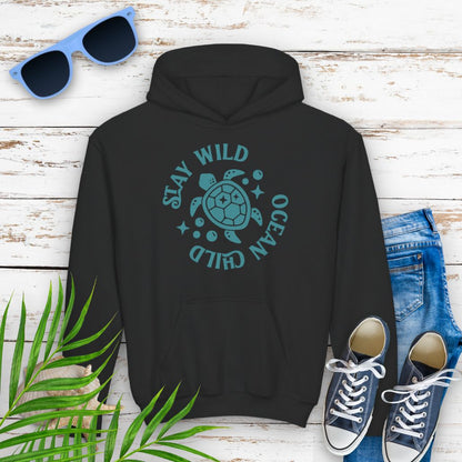 Black child hoodie with sea turtle with surrounding text Stay Wild Ocean Child.