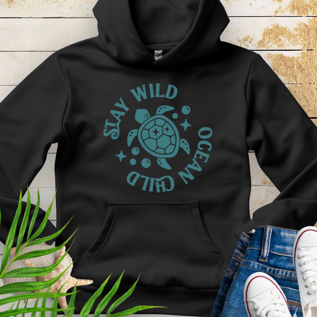 Black sea turtle lover hoodie with ocean-inspired Stay Wild Ocean Child phrase around a sea turtle.
