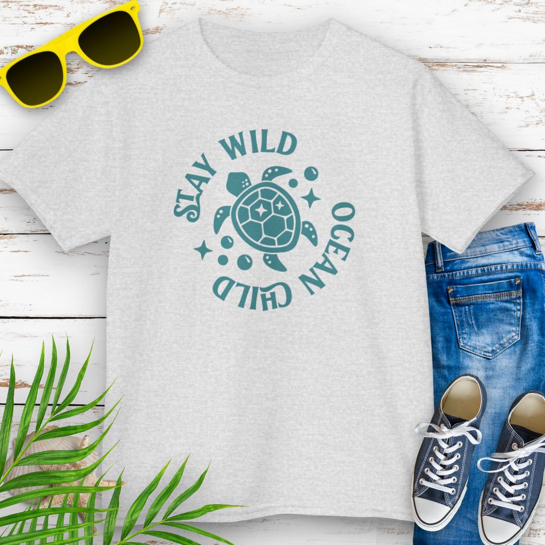 Ash kids ocean-themed T-shirt with sea turtle design and coastal vibes with phrase Stay Wild Ocean Child around sea turtle.