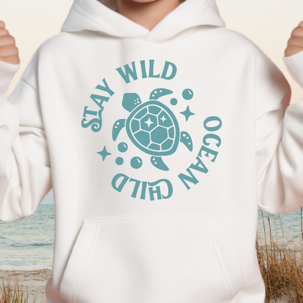 White child hoodie with sea turtle with surrounding text Stay Wild Ocean Child.