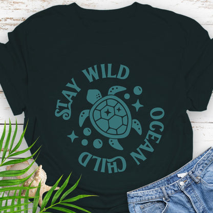 Black Stay Wild Ocean Child Sea Turtle T-Shirt featuring a sea turtle with phrase around the turtle - a beachy, free-spirited vibe for sea lovers.