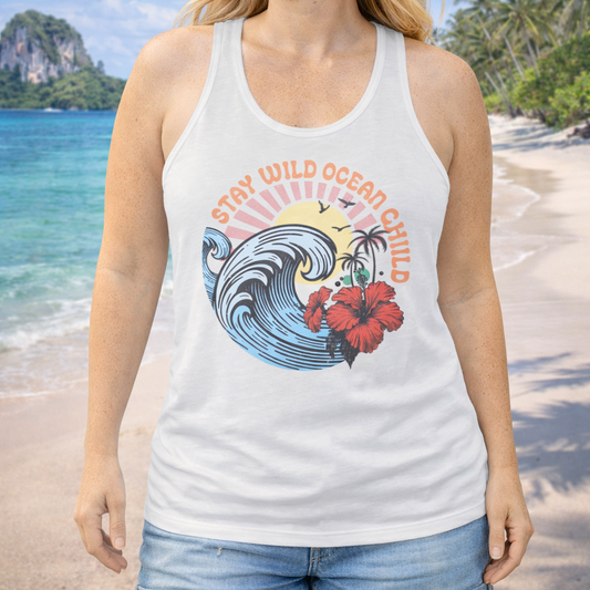 Woman wearing a tank top with a wave and flower design and text Stay Wild Ocean Child.