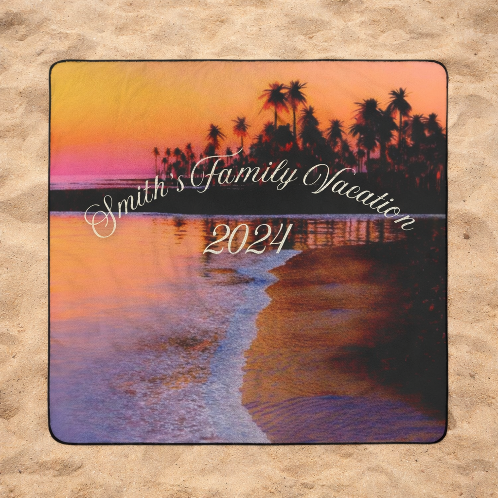 Personalized outdoor beach blanket with sunset and palm tree design, text 'Smith's Family Vacation 2024' on a sandy background.