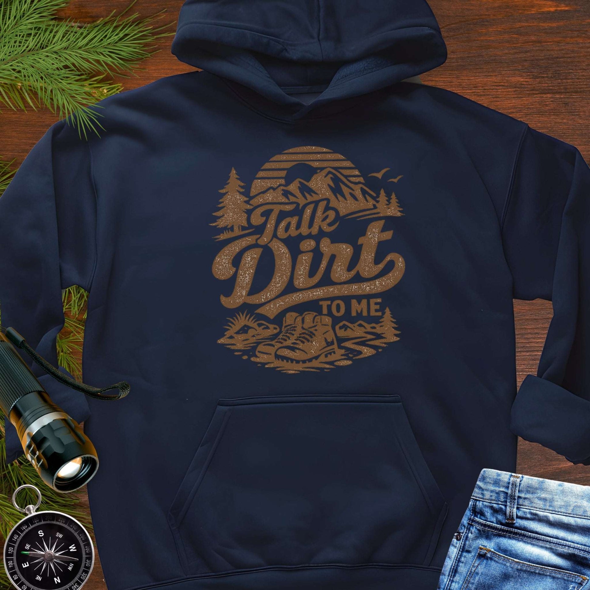 Navy blue hoodie with “Talk Dirt To Me” retro mountain and hiking boots graphic, outdoor adventure pullover sweatshirt.