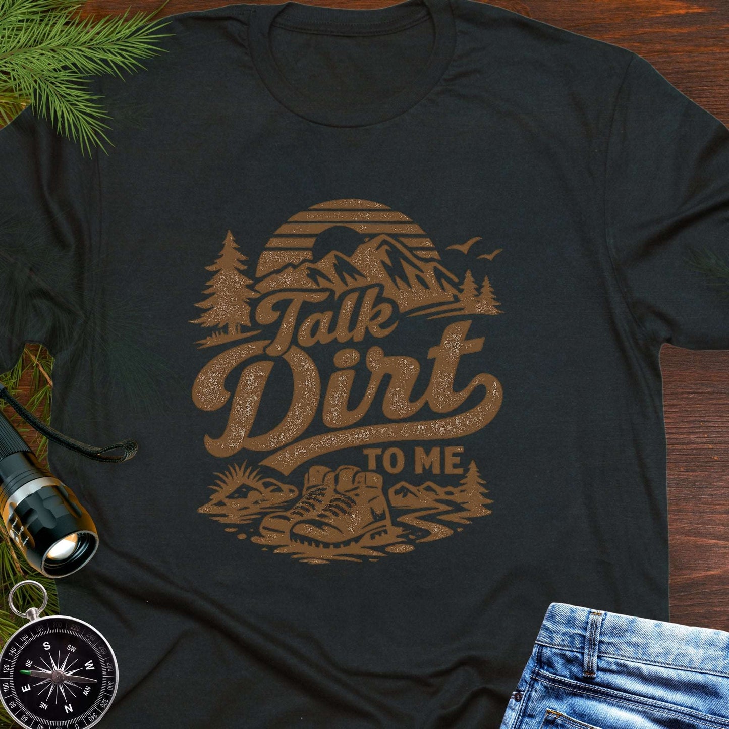 Black t-shirt with 'Talk Dirt to Me' graphic design with rugged mountain trail graphic—perfect for hiking, camping, and off-road lovers.