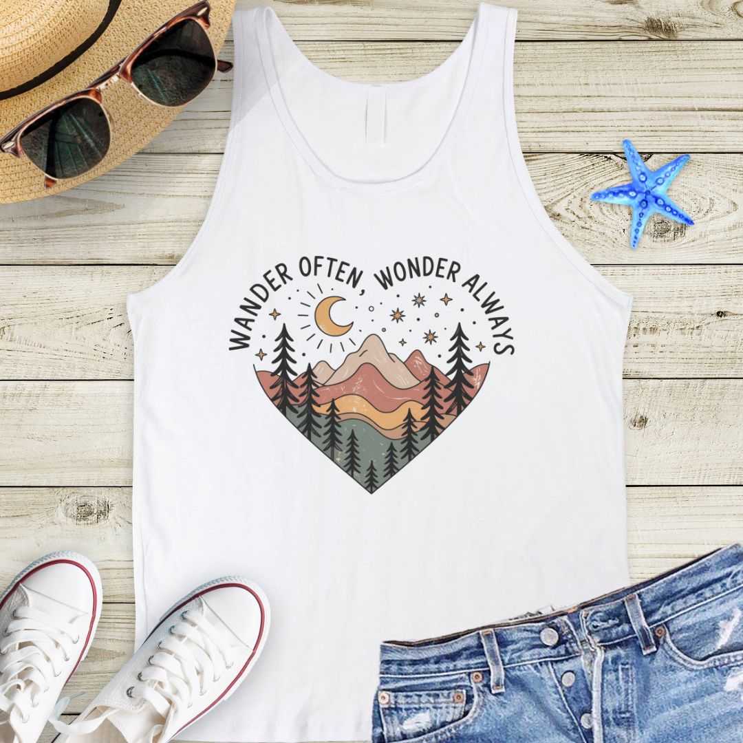 White unisex tank top with boho-style mountain landscape enclosed within a heart shape with wander often, wander always at the top of the heart.