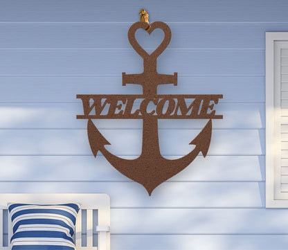 Copper metal wall art shaped like an anchor with a heart at the top and the word “Welcome” cut out in the center; made of powder-coated steel.